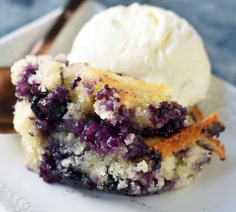 Texas-Style Blueberry Cobbler is a buttery, sweet dessert made with fresh blueberries, sugar, butter, milk and flour. The perfect summer dessert! Blueberry Breakfast Bars, Blueberry Crumb Bars, Blueberry Crumb Cake, Blueberry Crumble Bars, Blueberry Bars, Blueberry Breakfast, Blueberry Desserts, Blueberry Crumble, Blueberry Cobbler