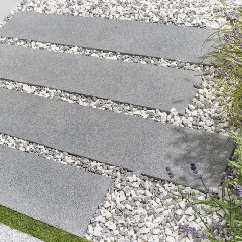 The Granite Rectangular Paving Slabs from Kelkay are a premium paving material and feature all the natural characteristics of granite; from high strength to low maintenance and finished in a stunning contemporary grey. #gardenoasis #gardeninspo #gardenaccessories  #summergarden #wintergarden #landscapingideas #gardenersworld #gardening #horticulture #garden #gardenlife #plants #flowers #nature #gardendecor #paving #gardenslabs #pavingslabs #drivewayinspo #kelkay #graniterectangularpavingslabs Granite Slabs Garden, Backyard Extension, Horticulture Garden, Garden Slabs, Sandstone Paving Slabs, Natural Stone Paving, Contemporary Garden Furniture, Herb Garden Pallet, Granite Paving