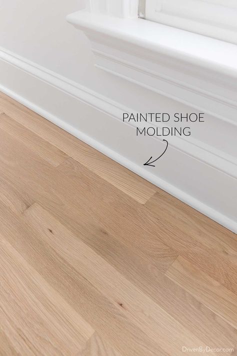 New shoe molding painted white Hardwood Floor Stain Colors, Oak Floor Stains, Staining Wood Floors, Floor Stain Colors, Wood Floor Stain Colors, Hardwood Floor Refinishing, Cottage Flooring, Red Oak Hardwood Floors, Floor Refinishing