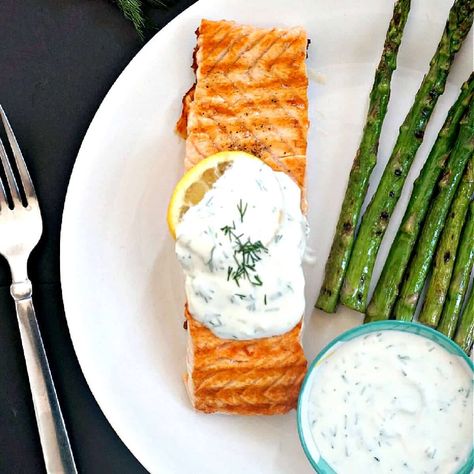 Grilled Salmon with Yogurt Dill Sauce and Asparagus, a healthy and delicious low-calorie and low-carb dinner that is ready in well under 15 minutes. Super easy to make, this easy salmon fillet recipe is a great addition to your Easter menu. Yogurt Dill Sauce, Salmon Fillet Recipes, Salmon Fillet, Easter Menu, Dill Sauce, Food Plan, Easy Salmon, Carb Dinner, Low Carb Dinner