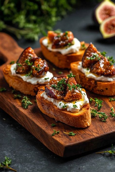 Crispy baguette slices topped with creamy goat cheese, fig preserves, and a drizzle of honey for a sweet-savory delight. #GoatCheeseCrostini #ElegantAppetizers #PartyFood Fig Crostini, Goat Cheese Fig, Fig Preserves, Baguette Slices, Goat Cheese Crostini, Creamy Goat Cheese, Elegant Appetizers, Sliced Baguette, Goat Cheese