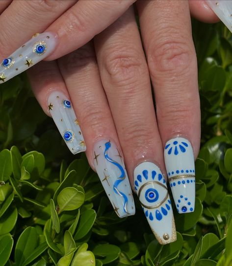 Looking for a nail design that’s as powerful as it is beautiful? 🌟 Evil Eye Nails are perfect blend of style and symbolism! 🧿The evil eye is more than just a trend; it’s an ancient symbol believed to ward off negative energy and bring good vibes your way. The evil eye can be customized to match your unique style. Beautifully done by @saruuhhclawsbrushednails ✨ Book your next appointment with her for a fun design! ✨Brushed Nail Salon 460 Hurffville Crosskeys Rd Sewell, NJ 08080 ✨ #shortnails... French And Evil Eye Nails, Evil Eye Gold Nails, Eye Of Protection Nails, Royal Blue Nails Evil Eye, Evil Eye Accent Nail, Blue French Tips, Evil Eye Nails, Eye Nails, Ancient Symbols