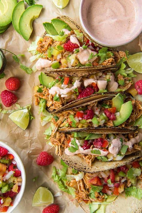 You only need 3 INGREDIENTS to whip up these unique Raspberry Chipotle Slow Cooker Chicken Tacos! Topping these healthy tacos with Raspberry Pineapple Salsa and a sweet & tart crema really makes the flavors shine. #crumbykitchen #tacos #tacotuesday #tacorecipes #chickenrecipes #chickentacos #slowcooker #crockpot #dinnerideas #dinnerrecipes Raspberry Chicken, Southwestern Food, Chipotle Tacos, Pineapple Salsa Recipe, Breakfast Cupcakes, Chipotle Crema, Make Shredded Chicken, Chipotle Seasoning, Slow Cooker Chicken Tacos