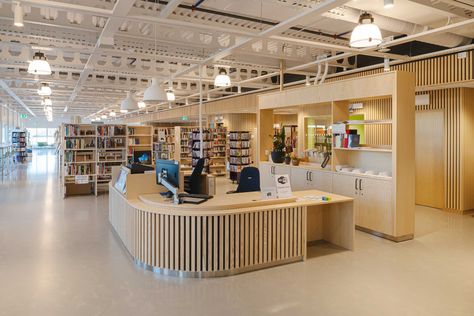 Finspång library | Artigo Library Self Checkout, Library Lighting Design, Circulation Desk Library, Library Of Things, Library Interior Design Public, Public Library Interior Design, Modern Library Aesthetic, Library Layout, Library Reception