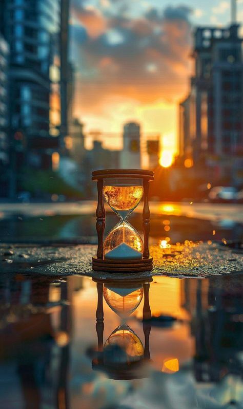 Prompt 👉Hourglass sitting on a puddle of water, painting, romance, sunrise light, gettyimages, beautiful wallpaper, watch photo, marc adamus, very beautiful photo against blurred urban high-rise buildings, beautiful sunny day, reflection in a puddle, the city is reflected in the glass of the clock, late evening, UHD 8K, river of time, it goes into eternity, amazing photo, clock, turnover, day - time, beautiful image 👉 if Like, please Follow and Share AI Graphics Studio 👇Contact on WhatsAPP: ... Time Pictures Clock, Puddle Of Water, Clock Aesthetic, Wallpaper Watch, Amazing Sunrise, Sunny D, Photo Clock, Late Evening, Beautiful Sunny Day