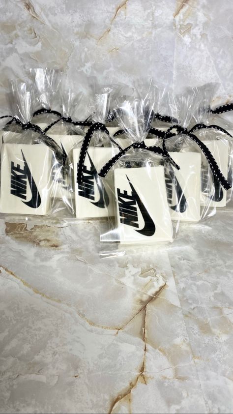 All Black Sneaker Ball Party, Nike Rice Crispy Treats, Nike Favor Boxes, Nike 1st Birthday Party Ideas, Sneaker Ball Treats, Sneaker Cake Pops, Sneaker Ball Candy Table, 50th Birthday Sneaker Ball, Nike 1st Birthday Party