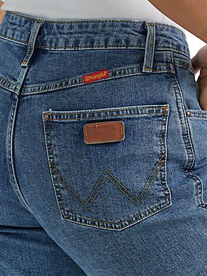 A COWBOY CUT® CLASSIC WITH ADDED STRETCHWhen it comes to finding a dependable jean, cowgirls all across the country know that Wrangler® jeans for women are as dependable as they come. Our women's Cowboy Cut® stretch jeans pay tribute to the original 14MWZ women's Western bootcut jeans you know but with a slightly lower rise that sits at the natural waistline as well as a hint of stretch to help you take on whatever the day brings. Our women's stretch jeans wouldn't be complete without all the authentic Wrangler® details you love, such as the leather patch, five-pocket styling, rive trim, and tapered leg. Womens Stretch Jeans, Wrangler Women, Wrangler Cowboy, Wrangler Cowboy Cut, Wrangler Jeans, Jeans For Women, Leather Patches, Christmas List, Stretch Jeans