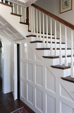 Hidden Door--paneling seems to do the best job of hiding it. Would be darker wood. Door Under Stairs, Closet Under Stairs, Stair Paneling, تحت الدرج, Traditional Staircase, Staircase Storage, Under Stairs Cupboard, Entry Design, Foyer Decorating