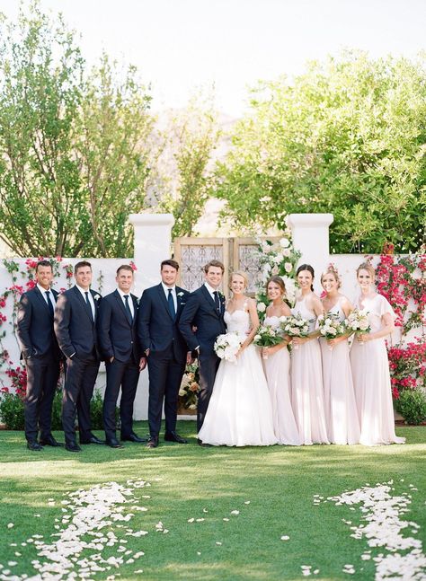 Blush pink bridesmaids dresses and groomsmen in black suits created a classic wedding party look! The bride and her bridesmaids all carried white wedding bouquets with orchids in them. To see this stunning Scottsdale wedding at El Chorro head to the blog! Wedding Bouquets With Orchids, Bouquets With Orchids, Groomsmen In Black, Classic Wedding Party, Scottsdale Wedding Venues, Pink Bridesmaids Dresses, Bride And Her Bridesmaids, Pink Bridesmaids, Blush Pink Bridesmaids