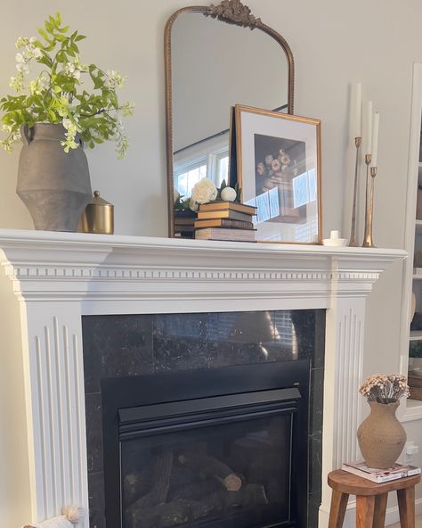 Home takes time… I figure this fireplace deserved a spot on my grid before I restyle it! I love redesigning my home and love bringing inspiration and ideas for your home! Big CHANGES are coming to my home so love to have you come along for the process! Have a beautiful Friday! Living room view | Vase | Target | Storage Books | Hobby Lobby | Artwork | PaperHouse Print Shop| Picture Frame | Homegoods | Tall Candlestick | Hobby Lobby | Small Candle Holder | AtHome | Wood Stool| Target . .... Mirror Mantle Decor, White Mantle Decor, Lobby Artwork, Mantle Decor With Mirror, Target Storage, Living Room View, Storage Books, White Mantle, Changes Are Coming