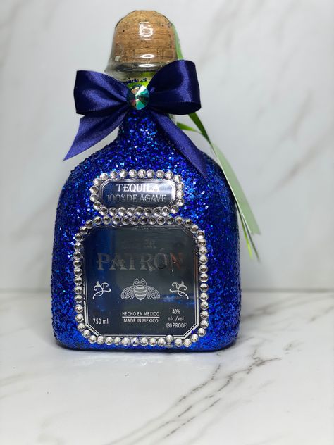 Blue chunky glitter with rhinestones around labels and dark blue ribbon bow Glitter Patron Bottle, Patron Bottles, Alcohol Bottle Decorations, Decorated Liquor Bottles, Blue Ribbon Bow, Patron Bottle, Bottle Decorations, Bling Bottles, Graduation Party Planning