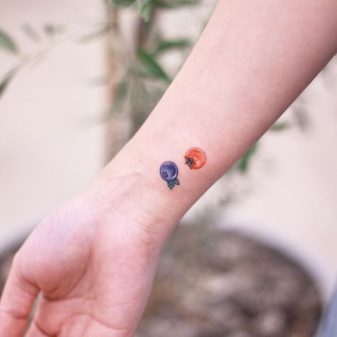 Cherry tomato and blueberry tattoos inked on the right wrist by tattooist Nemo Minimalist Blueberry Tattoo, Tiny Tomato Tattoo, Blueberry Tattoo Small Minimalist, Tiny Blueberry Tattoo, Blueberry Tattoo Minimalist, Berry Tattoo, Nemo Tattoo, Lit Tattoos, Tomato Tattoo