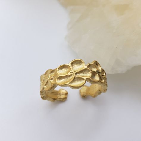 This ring is inspired by the floral pattern on a Chinese gilded bronze urn likely from the Qing Dynasty - the last imperial dynasty in Chinese history (1636–1912). The low relief, stylized flower pattern was combined with dragons and other Chinese symbols to create a beautifully detailed surface. #etsyshop #statementjewelry #etsystore #ringoftheday #etsyjewelry #ringsofinstagram #museumreproductions #rings #ring #antiquereproduction #antiquereproductions #antiquereproductionjewelry #chinese... Antique Gold Engraved Ceremonial Ring, Ancient Style Engraved Ceremonial Jewelry, Antique Brass Rings With Intricate Design, Ancient Style Carved Rings Gift, Qing Dynasty Jewelry, Chinese History, Chinese Symbols, Qing Dynasty, Etsy Jewelry