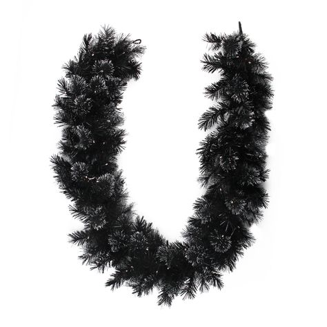 Get the 6ft. White LED Black Bristle Garland at Michaels. com. This stunning Christmas garland is a unique addition to your seasonal décor. This stunning Christmas garland is a unique addition to your seasonal décor. With the shimmering effects and LED lights it illuminates the entire background. If one bulb burns out the rest will stay lit. Lights are equipped with Lamp Lock feature which makes them replaceable interchangeable and keep them from falling out. Convenient Bendable wire center allo Black Garland, Battery Operated Garland, Pre Lit Garland, Traditional Holiday Decor, Mini Led Lights, Artificial Christmas Garland, Warm White Led Lights, Pine Garland, Holiday Trends