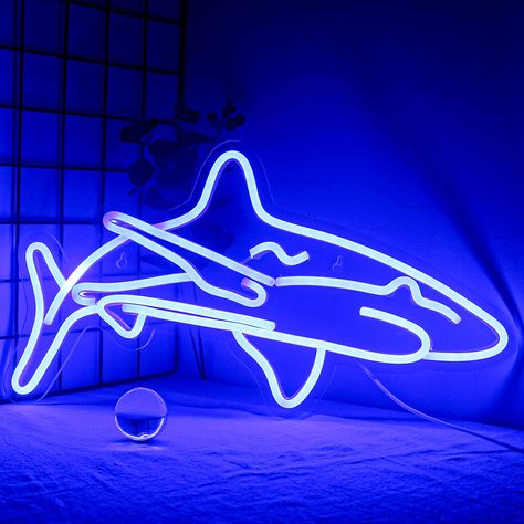 PRICES MAY VARY. LIFELIKE ARTISTIC SHARK CARVING NEON LIGHTS:The design of shark neon signs is inspired by the ocean,and the interesting lighting of shark neon brings a nice ocean atmosphere to your store and bedroom.It’s a good choice to light up your room or decorate your shop.No one knows sharks neon lights better than me! RUGGED ACRYLIC TRANSPARENT BACK PANEL:Shark led neon signs has the characteristics of extremely strong light transmittance, soft and uniform light, and clearer hyperopia ef Birthday Bedroom, Neon Sign For Bedroom, Neon Azul, Sign For Bedroom, Jaws Movie, Shark Decor, Unique Night Lights, Bedroom Blue, Dorm Inspo