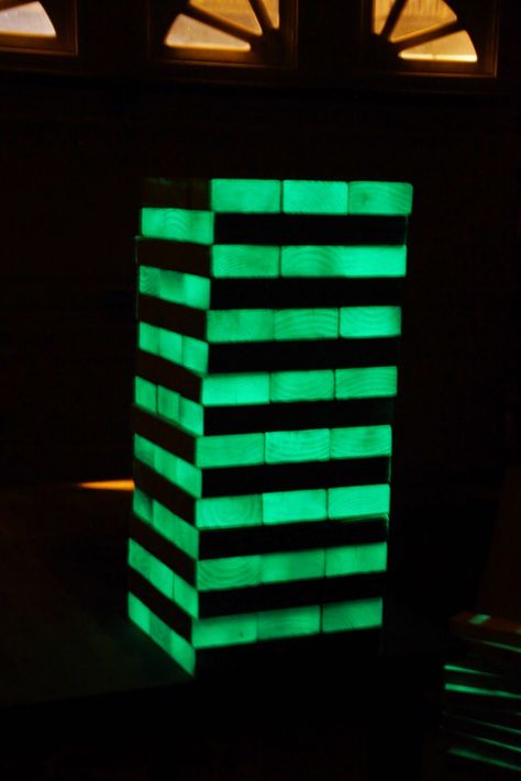 Suzie's Tidbits: Giant Glowing Jenga #DIY, #Jenga, #Backyardgames, #woodworking, #projects Glow In The Dark Jenga, Life Size Jenga Diy, Giant Jenga Drinking Game Diy, Giant Jenga Diy, Jumbo Jenga, Big Jenga, Yard Jenga, Diy Jenga, Jenga Tower