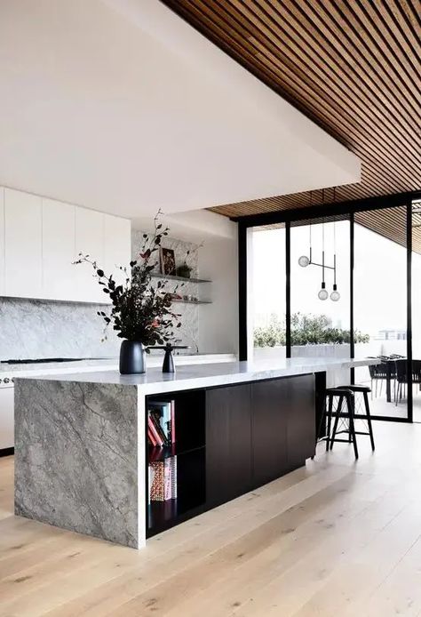 Picture of a gorgeous contemporary ktichen with sleek white cabinets, a grey stone backsplash and countertops, a black kitchen island and a layered ceiling Extra Kitchen Storage, Grey Kitchen Island, Black Kitchen Island, Stone Backsplash, Sleek Kitchen, Stone Kitchen, Black Kitchen, Black Kitchens, Outdoor Oasis