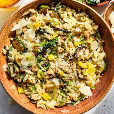 Zucchini Orzo Salad with Pepperoncini Dressing - Dishing Out Health Zucchini Orzo, Pickled Pepperoncini, Shaved Parmesan, Pesto Salmon, Pepperoncini Peppers, Orzo Salad, Nutritious Recipes, Walnut Salad, Garlic Clove