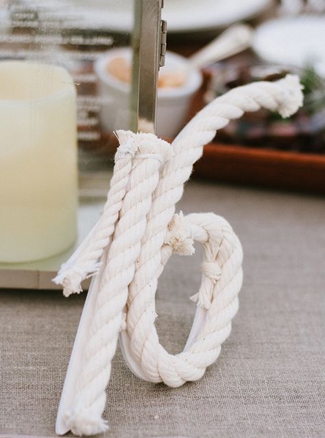 This is a unique way to display table numbers at your wedding. Choose an elegant font choice to balance the rope look! Nautical Wedding Inspiration, Beach Wedding Decorations Reception, Dream Ideas, Yacht Wedding, Sea Wedding, Wedding Simple, Beach Wedding Flowers, Beach Wedding Favors, Sea Theme