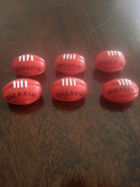 AFL Sherrin Football cupcake toppers made with homemade marshmallow fondant Afl Cupcakes, Collingwood Cake, Afl Cake, Afl Party, Gf Day, Football Cake Pops, Football Cupcake Toppers, Homemade Marshmallow Fondant, Football Cupcake