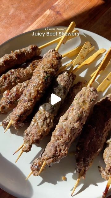 Layla on Instagram: "Ground Beef Skewers// recipe 📩  Ingredients: -1 lb ground beef  -1/4 cup parsley  -1/4 cup grated white onion -1 tbsp gee butter  -5-6 cloves minced garlic  -2 tsp salt  -1 tsp black pepper  -1 tsp garlic powder  -1 tsp cumin  -1/4 tsp ginger powder (optional)  -1/2 tsp ground coriander  -1/4 tsp all spice   Directions: 1. Mix in the parsley, onion, gee butter, garlic, & spices into the ground beef  2. Warm up a skillet and grease it with gee butter.  3. Using soaked wooden skewers or metal skewers, tightly wrap 1/4 cup of the beef onto the skewer. 4. Cook each skewer for 3-5 min until each side becomes charred 5. Enjoy with garlic sauce or tzatziki   #easyrecipes #beefskewers #beefkebab" Ground Beef Skewers, Wooden Skewers, All Spice, Beef Skewers, Metal Skewers, Ginger Powder, White Onion, Recipe Ingredients, Garlic Sauce