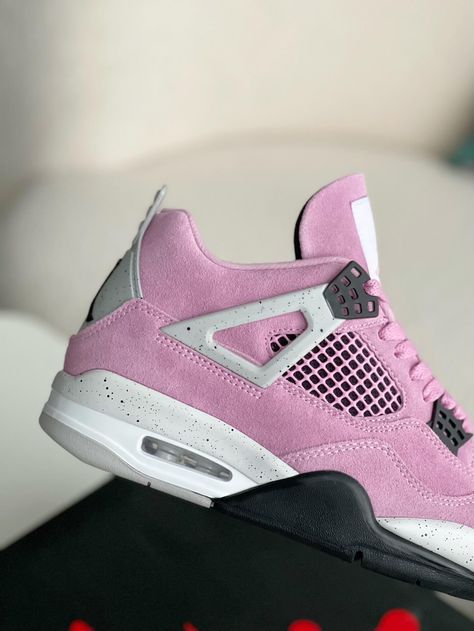 Inspired by the Air Jordan 4 Retro "Orchid," these sneakers capture the vibrant essence of the original. Crafted with high-quality materials, they feature a striking pink suede upper, accented with black and white details. The iconic Jumpman logo and speckled "cement" midsole complete the look. Step out in style and confidence with these premium-inspired sneakers. Jordan 4 Off White Pink, Jordan Retro 4 Off White, Pink Jordan 4, Shoes Air Jordans Pink, Pink Jordans 4s, Jordens4 Pink, Pink Retro Jordans, Air Jordan 4 Outfit Women, Pink High-top Jordan Shoes For Streetwear