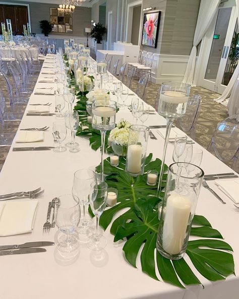 White Green Gold Tropical Party, Monstera Leaf Wedding Table Decor, Tropical Leaves Table Decor, Monstera Leaf Table Decor, Wedding Aisle Decorations Outdoor Beach, Monstera Leaf Party Theme, Monstera Wedding Decor, Monstera Leaf Centerpiece, Jungle Tablescape