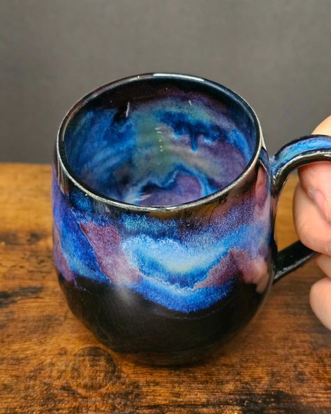 Lost in the colours of our new galaxy mug 💙 💜 🖤 🌠 #pottery #potterystudio #potterylove #handmade #handmademug #turtle #throwing #töpfernmachtglücklich #töpfern #ceramics #ceramicart #mug #galaxy #colorful