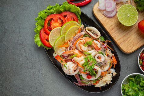 Thai spicy mixed seafood salad known as Pah Talay is a typical dish in Thailand.... Pulpo Recipe, Mixed Seafood, Spicy Seafood, Octopus Salad, Citrus Dressing, Pickled Garlic, Seafood Salad, Large Salad Bowl, Salad Ingredients