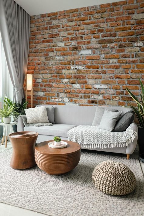 Living room with brick wall