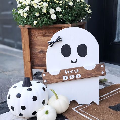 I mean, come on 👻 obsessed with ghosts, so of course I made these cuties. The little hands with the hey boo sign is perfect! . . So who's ready $24 for my.hey boo porch ghost (Will be doing a big batch once again ) #handmade#wooddecor#rusticpallet#woodworking#supportsmallbusiness#supporthandmade#falldecor#porch#heyboo#ghosts#styledporch Hey Boo Sign, Boo Sign, Fall Stuff, Hey Boo, Halloween Decorations, Porch, Ghost, Woodworking, Halloween