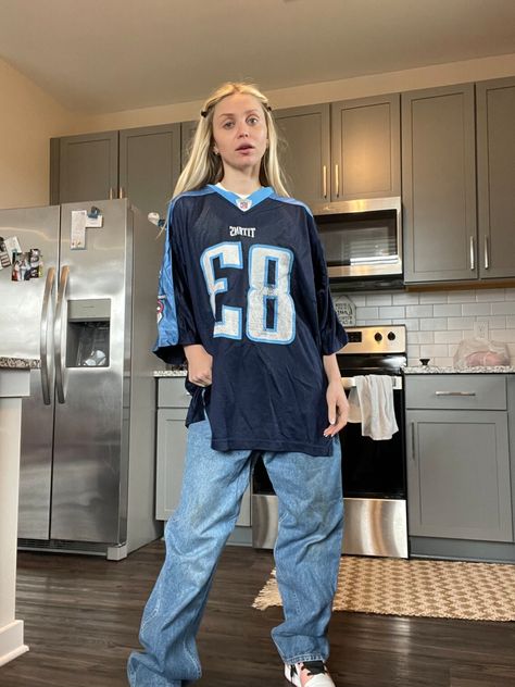 vintage oversized clothing vibes
trendy 
fashion
sports 
new york style
maximalism fashion Long Sleeve Jersey Outfit, Sports Shirt Outfit, Jersey Shirt Outfit, Baseball Jersey Outfit, Titans Jersey, Long Sleeve Shirt Outfits, Vintage Baggy Jeans, Vintage Tennessee, Baggy Shirts