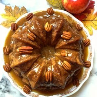 Apple Dapple Cake with Caramel Glaze - Grits and Pinecones Apple Dapple Cake, Apple Dapple, Pecan Praline Cake, Delicious Thanksgiving Desserts, Moist Apple Cake, Thanksgiving Desserts Kids, Praline Cake, Fun Thanksgiving Desserts, Cake With Caramel