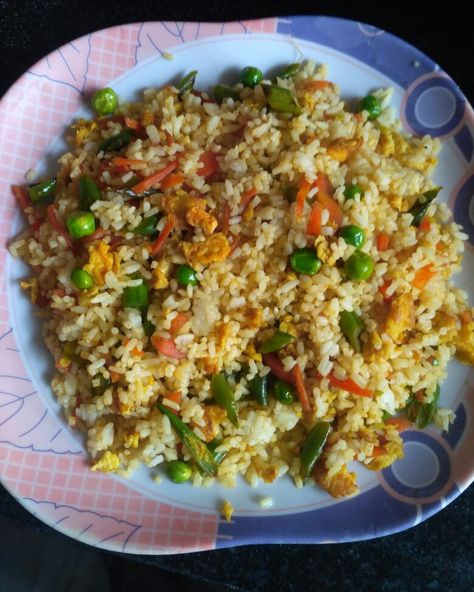 Add fried chopped veggies like beans, carrots and  scrambled eggs to your leftover rice and make a delicious dish out of it Chopped Veggies, Veggie Fried Rice, Easy Veggie, Leftover Rice, Scrambled Eggs, Tasty Dishes, Fried Rice, Carrots, Cooking Recipes