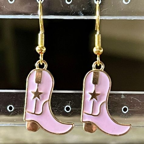 Western Charm: Dainty Handmade Pink Cowboy Boot Earrings - Cowgirl Jewelry #CowgirlEarrings #CowboyRodeoJewelry #CuteTrendyEarrings #GoldSilverEarrings #CowgirlStyle #GiftsForHer #HandmadeDainty #SpecialRodeoGirl #WesternStyle #EarringsEveryday Pink Cowboy Boot, Cowboy Boot Earrings, Boot Earrings, Rodeo Jewelry, Pink Cowboy Boots, Rodeo Girls, Pink Cowboy, Cowgirl Jewelry, Trendy Earrings