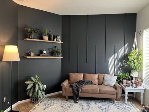 Black Wall Sitting Room, Black Matte Accent Wall Bedroom, Black Accent Wall Game Room, Livingroom Accent Wall Color Ideas, Black Wall Green Couch, Black Wood Accent Wall Living Room, Tv Room Dark Walls, Charcoal Gray Accent Wall Living Room, Black Accent Wall Design