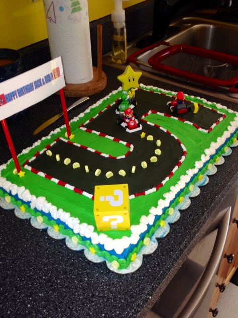 Mariokart cake Mario And Princess Peach Birthday Cake, Mario Kart Birthday Cupcakes, Mario Birthday Cake 5, Mario Kart Sheet Cake, Mario Brothers Birthday Party Ideas Cake, Mario Kart Themed Birthday Party, Mario Sheet Cake Ideas, Mario Kart Birthday Party Cake, Mario Cake Ideas Easy