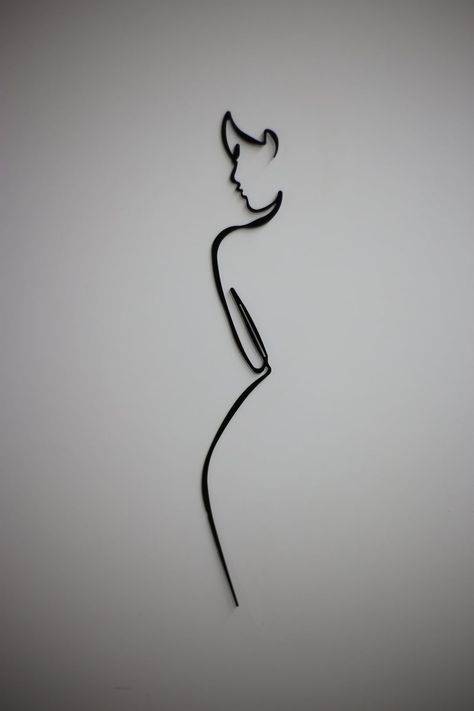 Embrace simplicity and sophistication with our Minimalist Line Art Metal Wall Decor. Featuring clean lines and sleek design, this minimalist piece adds a touch of modern elegance to any space. Crafted from high-quality metal, it offers durability and style, making it a versatile choice for home decor enthusiasts. Whether adorning your living room, bedroom, or office, this wall art effortlessly complements any interior aesthetic, infusing your space with minimalist charm. Inter Tattoo, Dimensional Drawing, Gallery Ideas, Minimalist Line Art, Wall Decor Metal, Sinus Infection, Interior Aesthetic, Geometric Wall Art, Wire Sculpture