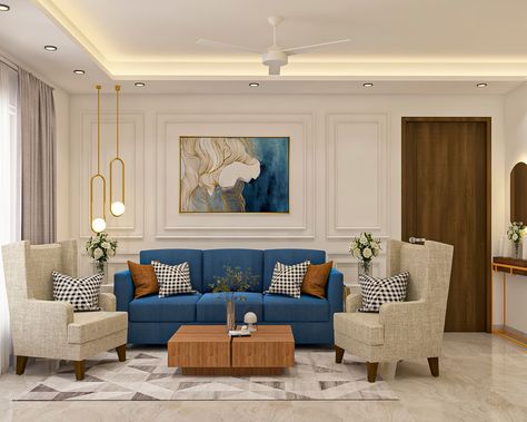 Living Room Design With Blue Sofa And Beige Accent Chairs | Livspace Low Floor Bed, Beige Accent Chairs, Blue Sofa Chair, Beige Accent Chair, White Wall Paint, Patterned Cushions, Contemporary Living Room Design, Elegant Aesthetic, Contemporary Room