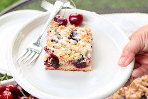 Cherries and almonds are a match made in heaven, and these summery bars are the perfect blend of the two.  You’ll notice the photo is of a 9 x 13 inch pan.  As I had a large group to feed, I increased all the ingredients by another half.  Since 1 ½ eggs is a problematic … Cherry Slice, Cakes Fancy, Cake Stall, Cherry Bakewell, Almond Bars, Canned Cherries, Individual Desserts, Cherry Almond, Slices Recipes