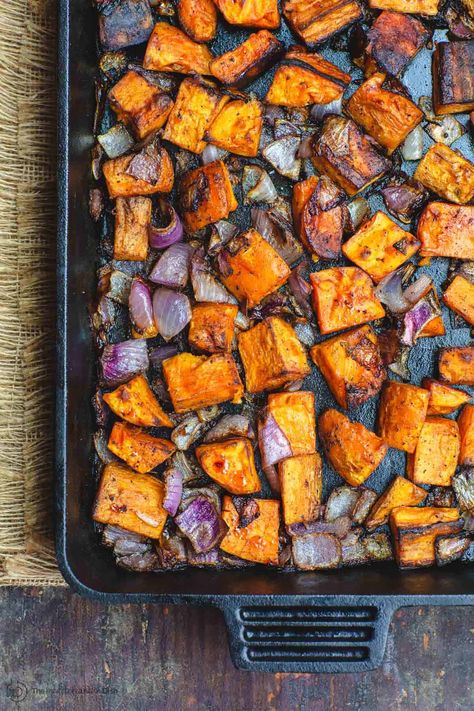 You'll love these easy cinnamon roasted sweet potatoes with caramelized onions. Perfectly creamy on the inside and well-browned on the outside. A couple small tips make all the difference, so be sure to check this recipe out ASAP! #sweetpotatoes #potatoes #roastedpotatoes #roastedsweetpotatoes #sides #thanksgiving #mediterraneandiet #mediterraneanfood #mediterraneanrecipes #healthyrecipes #roastedvegetables Cinnamon Roasted Sweet Potatoes, Sides Thanksgiving, Roasted Sweet Potato Cubes, Easy Ratatouille Recipes, Sweet Potato Recipes Roasted, Greek Potatoes, The Mediterranean Dish, Easy Potato Recipes, Roasted Sweet Potato