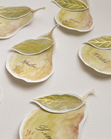 Maybe it’s time to start a fruit series for place cards 🍐✨ Previously, we had our apricot peaches, and today, we have cute little pears. What fruit do you think we should do next? #pearplacecards #pearart #watercolourart #customink #artisticprocess #bts #weddingdetails #eventstyling #fruitplacecards #fruitinspired Thanksgiving Watercolor Place Cards, Pear Place Card, The Perfect Pear Bridal Shower Theme, Pear Themed Party, Watercolor Place Cards, Thanksgiving Watercolor, Thanksgiving Vibes, Dinner Party Table Settings, Pear Art