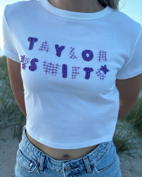 Custom artist shirts! This one is for Taylor swift💜💜💜 Photo taken by @brinley.haugh ! - - - - - - - - - - - - - #taylorswift #taylornation #ts #stitchedbysomer #etsy #etsyseller #sweatshirt #customsweatshirt #3hearts #3heartssweatshirt #heartcollection #custom #handsewn #handmade #heartonmysleeve #topsail #topsailisland #surfcity #wimington #wilmingtonnc #croppedtee #customtee #custommade #customshirts Diy Concert Shirt, Taylor Swift Tshirt, Patchwork Tee, Jeans Embroidery, Etsy Clothes, Taylor Swift Shirts, Artist Shirts, Sewing Shirts, Diy Shirts