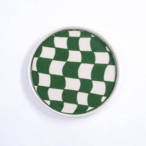 Handmade and hand painted ceramic plate which is perfect for saucer, dessert plate or jewelry orginizer. Color: Green checkered print. Shiny finish. You can wash it in the dishwasher but we recommend hand wash. Safe to contact with foods. All products tested in oven (250 c celsius).  Diameter: 14,5 cm Side Length: 1 cm Price is just for the plate. PLEASE LOOK CLOSELY BEFORE PURCHASING! There can be little flows and differences on products which make them unique. Pottery Painting Green, Painted Ceramic Mug, Ceramic Plate Set, Painted Ceramic Plates, Handmade Ceramics Plates, Green Checkered, Flower Bomb, Checkered Print, Hand Painted Ceramic