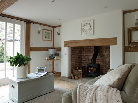 Lovely cottage lounge. Great fireplace with log burning stove Salons Cottage, Cottage Lounge, Stove Ideas, Border Oak, Oak Frame House, Inglenook Fireplace, Fire Places, Urban Interiors, Chimney Breast