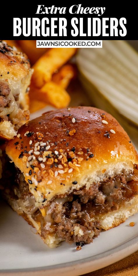 These Extra Cheesy Hamburger Sliders with garlic butter everything bagel buns are an easy and fun appetizer with everything you love about a classic cheeseburger, in a bite sized form. Easily prepped ahead, these burger sliders make a shareable snack for any party. Serve them with a quick and easy burger sauce for the ultimate cheesy bite! The ultimate ground beef hamburger sliders recipe! Easy Burger Sauce, Bagel Buns, Pretzel Bun Sliders, Sliders Recipes Hamburger, Crockpot Party Food, Classic Cheeseburger, Hamburger Sliders, Easy Burgers, Mini Sliders