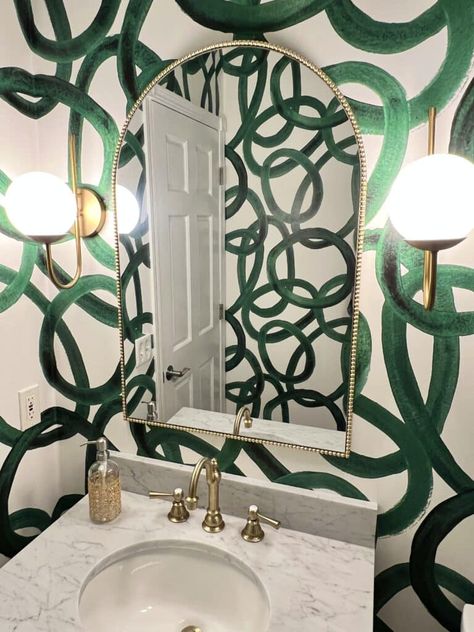 how high to hang bathroom sconces: Two wall sconces flank a gold framed mirror in a powder room. Maximalist Half Bath, Dark Half Bath, Half Bath Wallpaper, Half Bath Makeover, Maximalist Bathroom, Farmhouse Apartment, Urban Garden Design, Bath Makeover, Dopamine Decor