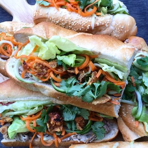 Mention Vietnamese street food and I immediately think of pork banh mi. The ultimate sandwich. A freshly baked crusty baguette roll filled to bursting with roast pork and pate and generous handfuls… Cucumber Ribbons, Pork Banh Mi, Pickled Carrot, Ultimate Sandwich, Vietnamese Street Food, Pickled Carrots, Roast Pork, Banh Mi, Asian Dishes