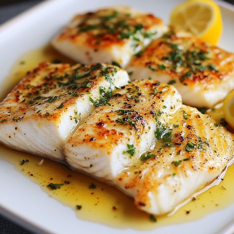 🍋 Zesty Lemon Butter Fish Fillet: Refresh your palate with this vibrant, buttery delight! 🐟🍋 #SeafoodLovers #ZestyFlavor #HealthyEating Zesty Lemon Butter Fish Fillet Ingredients: Fish fillets (4 pieces) Lemon juice (1/4 cup) Lemon zest (1 tbsp) Butter (4 tbsp) Garlic (2 cloves, minced) Olive oil (2 tbsp) Salt and pepper (to taste) Fresh parsley (1 tbsp, chopped) Instructions: Season fish fillets with salt and pepper. Heat olive oil and butter in a pan over medium heat. Add garlic and coo... Lemon Butter Fish, Butter Fish, Fish Meal, Homemade Donuts Recipe, Fish Fillets, Foreign Food, Fish Dinner, Food Babe, Fish Food