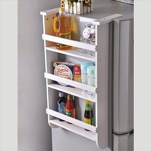 Or if your fridge isn’t up against the wall, turn the free side into storage. | 23 Clever Things That Will Actually Organize Your Tiny Apartment Refrigerator Wall, Tiny House Talk, Extra Shelf, Tiny Apartments, Door Organizer, Understairs Storage, Space Organizer, Tiny Apartment, Closet Space